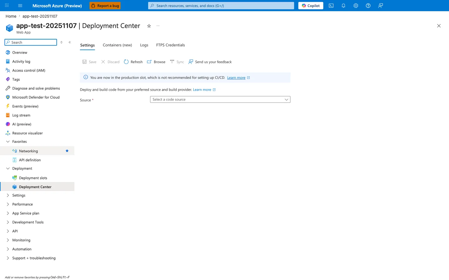 Deployment Center blade for a Web App with four tabs — Settings (active), Containers (new), Logs, and FTPS Credentials. The command bar shows Save, Discard, Refresh, Browse, Sync, and Send us your feedback actions. A prominent blue info banner reads "You are now in the production slot, which is not recommended for setting up CI/CD" with a "Learn more" link. The body explains "Deploy and build code from your preferred source and build provider" with another Learn more link, followed by a required Source field whose dropdown shows the placeholder text "Select a code source" and is currently empty. The left navigation shows the Deployment group expanded with Deployment slots and Deployment Center (active) entries.