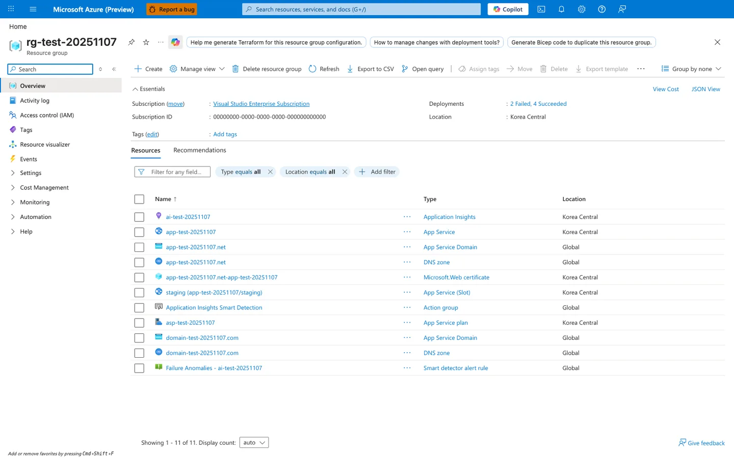 Resource group overview blade for `rg-test-20251107` in Korea Central showing an Essentials panel with Subscription "Visual Studio Enterprise Subscription", Subscription ID `00000000-0000-0000-0000-000000000000`, Deployments "2 Failed, 4 Succeeded", and Location "Korea Central". The Resources tab (next to Recommendations) lists all 11 related resources with columns Name, Type, and Location — `ai-test-20251107` (Application Insights), `app-test-20251107` (App Service), `app-test-20251107.net` (App Service Domain), `app-test-20251107.net` (DNS zone), `app-test-20251107.net-app-test-20251107` (Microsoft.Web certificate), `staging (app-test-20251107/staging)` (App Service (Slot)), `Application Insights Smart Detection` (Action group), `asp-test-20251107` (App Service plan), `domain-test-20251107.com` (App Service Domain), `domain-test-20251107.com` (DNS zone), and `Failure Anomalies - ai-test-20251107` (Smart detector alert rule). The command bar includes Create, Manage view, Delete resource group, Refresh, Export to CSV, Open query, Assign tags, Move, Delete, and Export template buttons.