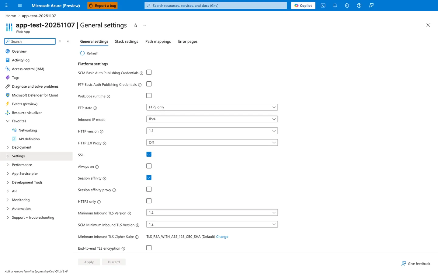Azure portal Configuration > General settings blade for app-test-20251107 with tabs General settings (active), Stack settings, Path mappings, Error pages; left service navigation showing Overview, Activity log, Access control (IAM), Tags, Diagnose and solve problems, Microsoft Defender for Cloud, Events (preview), Resource visualizer, Favorites (with Networking and API definition pinned), and a collapsed Settings group; a Platform settings panel listing SCM Basic Auth Publishing Credentials, FTP Basic Auth Publishing Credentials, WebJobs runtime, FTP state (FTPS only), Inbound IP mode (IPv4), HTTP version (1.1), HTTP 2.0 Proxy (Off), SSH (enabled), Always on (toggle disabled), Session affinity (enabled), Session affinity proxy (disabled), HTTPS only (disabled), Minimum Inbound TLS Version (1.2), SCM Minimum Inbound TLS Version (1.2), Minimum Inbound TLS Cipher Suite (TLS_RSA_WITH_AES_128_CBC_SHA, Default), and End-to-end TLS encryption (disabled); Apply and Discard action buttons at the bottom.