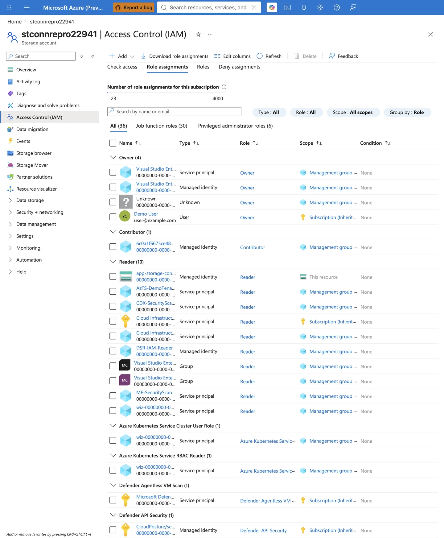 Storage account Access control IAM Role assignments tab grouped by role, showing the App Service managed identity under the Reader group with the Reader role scoped to This resource and no data-plane storage role