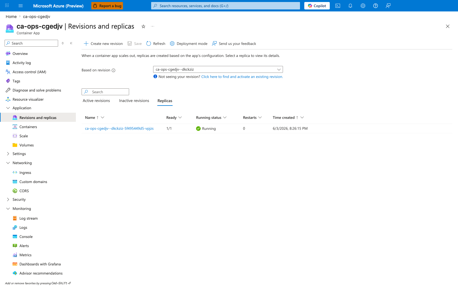 Replicas tab showing one running replica with revision and creation timestamp