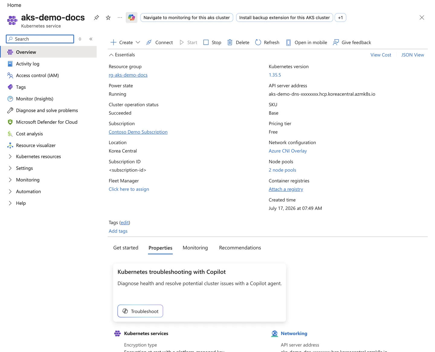 Azure Portal AKS cluster Overview blade showing sanitized cluster essentials and a healthy running status