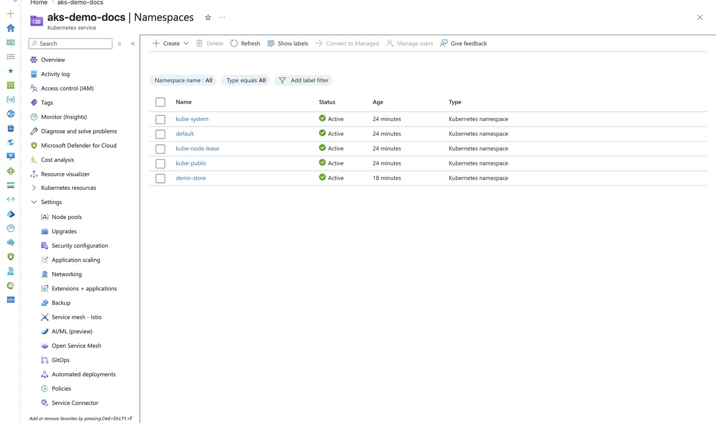 Azure Portal AKS Namespaces blade showing system namespaces and an application namespace, all Active